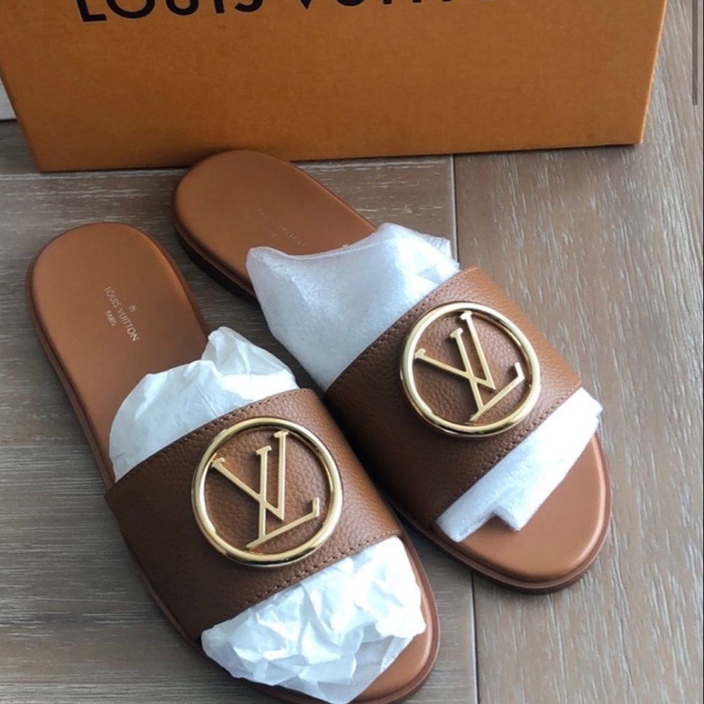 Louis Vuitton lock it flat mule